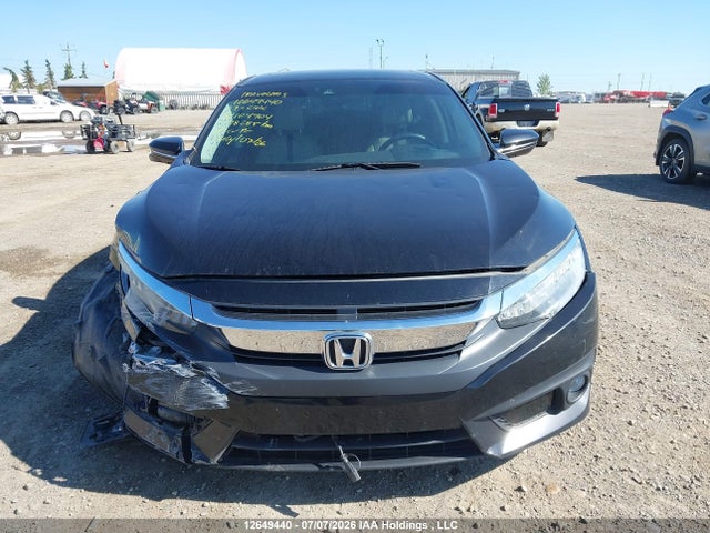 2017 Honda Civic Touring მანქანა იყიდება აუქციონზე, vin: 2HGFC1F96HH104904, აუქციონის ნომერი: 12649440