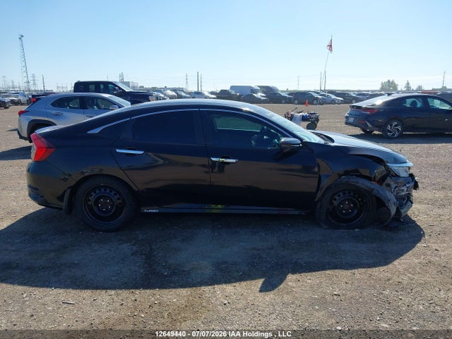 2017 Honda Civic Touring მანქანა იყიდება აუქციონზე, vin: 2HGFC1F96HH104904, აუქციონის ნომერი: 12649440