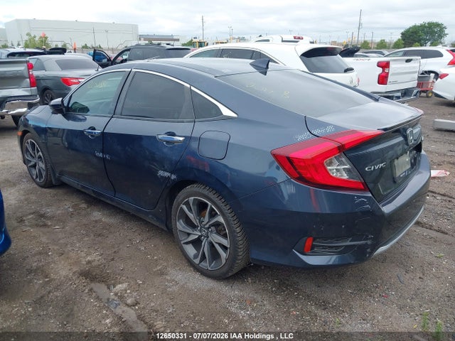 2020 Honda Civic Touring მანქანა იყიდება აუქციონზე, vin: 2HGFC1F9XLH106132, აუქციონის ნომერი: 12650331