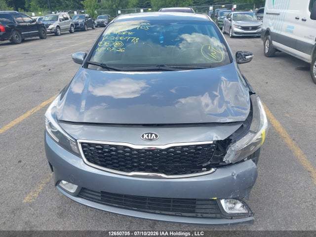 12650705 :رقم المزاد ، 3KPFL4A88JE206978 vin ، 2018 Kia Forte Ex مزاد بيع