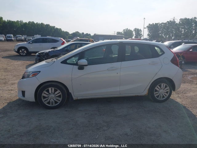 Auction sale of the 2015 Honda Fit Lx, vin: 3HGGK5H5XFM103312, lot number: 12650709