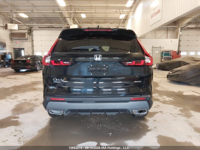Auction sale of the 2025 Honda Cr-v Touring Hybrid, vin: 2HKRS6H97SH219454, lot number: 12652215