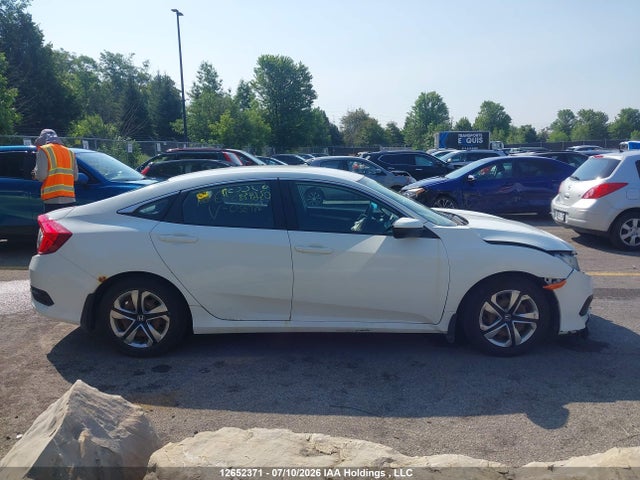 Продажа на аукционе авто 2016 Honda Civic Lx, vin: 2HGFC2E55GH036498, номер лота: 12652371