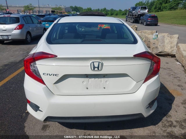 Продажа на аукционе авто 2016 Honda Civic Lx, vin: 2HGFC2E55GH036498, номер лота: 12652371