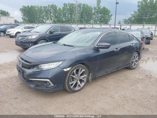 2019 Honda Civic Touring მანქანა იყიდება აუქციონზე, vin: 2HGFC1F95KH104156, აუქციონის ნომერი: 12652526