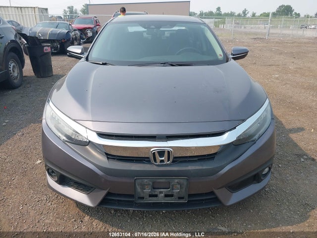 2018 Honda Civic Touring მანქანა იყიდება აუქციონზე, vin: 2HGFC1F90JH105245, აუქციონის ნომერი: 12653104