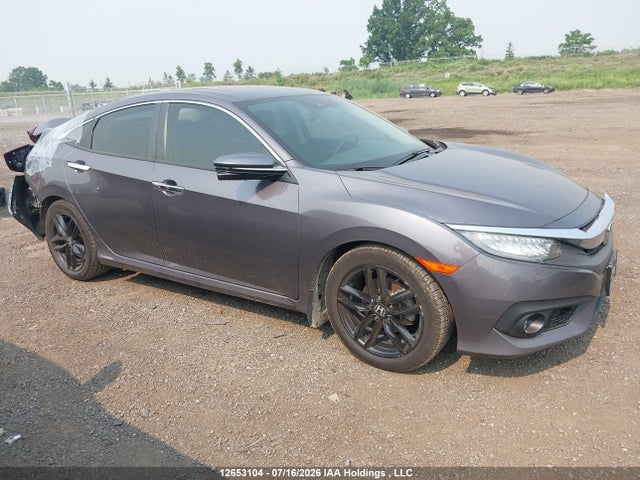 2018 Honda Civic Touring მანქანა იყიდება აუქციონზე, vin: 2HGFC1F90JH105245, აუქციონის ნომერი: 12653104
