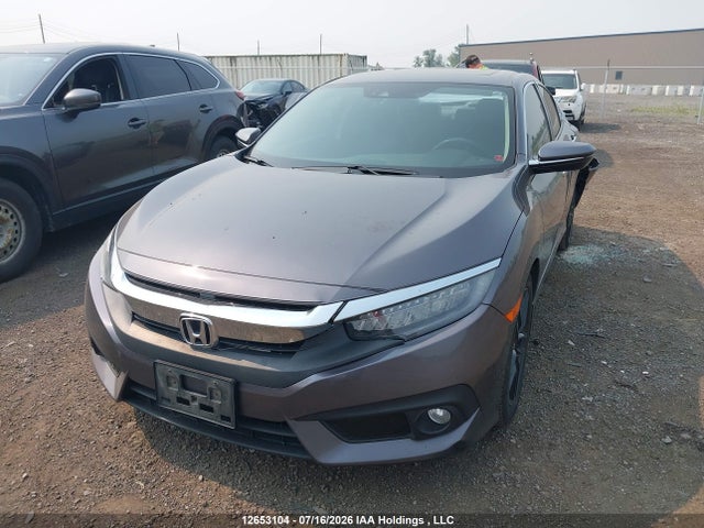 2018 Honda Civic Touring მანქანა იყიდება აუქციონზე, vin: 2HGFC1F90JH105245, აუქციონის ნომერი: 12653104