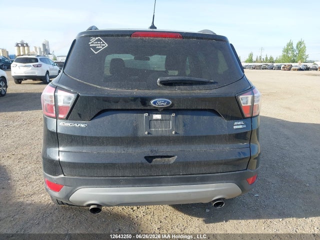 12643250 :رقم المزاد ، 1FMCU9HD4JUB88153 vin ، 2018 Ford Escape Sel مزاد بيع