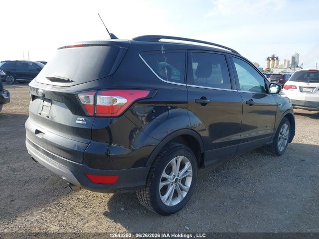 12643250 :رقم المزاد ، 1FMCU9HD4JUB88153 vin ، 2018 Ford Escape Sel مزاد بيع
