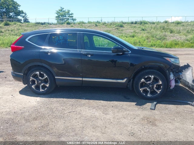 12653184 :رقم المزاد ، 2HKRW2H90HH116527 vin ، 2017 Honda Cr-v Touring مزاد بيع