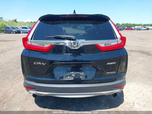 12653184 :رقم المزاد ، 2HKRW2H90HH116527 vin ، 2017 Honda Cr-v Touring مزاد بيع