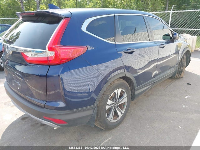 12653365 :رقم المزاد ، 2HKRW1H39HH000507 vin ، 2017 Honda Cr-v Lx مزاد بيع