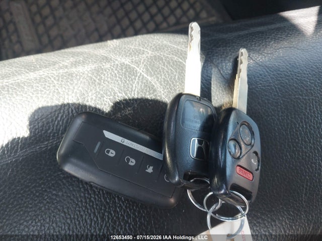 2010 Honda Pilot Touring მანქანა იყიდება აუქციონზე, vin: 5FNYF4H94AB502847, აუქციონის ნომერი: 12653450