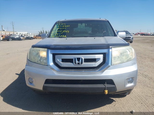 2010 Honda Pilot Touring მანქანა იყიდება აუქციონზე, vin: 5FNYF4H94AB502847, აუქციონის ნომერი: 12653450