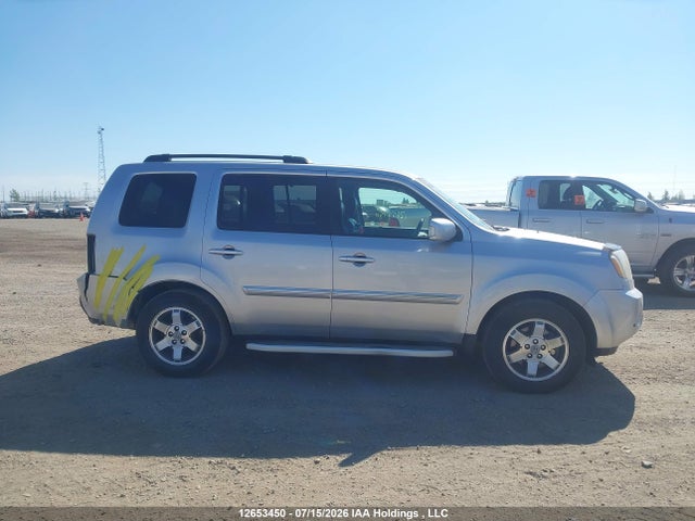 2010 Honda Pilot Touring მანქანა იყიდება აუქციონზე, vin: 5FNYF4H94AB502847, აუქციონის ნომერი: 12653450