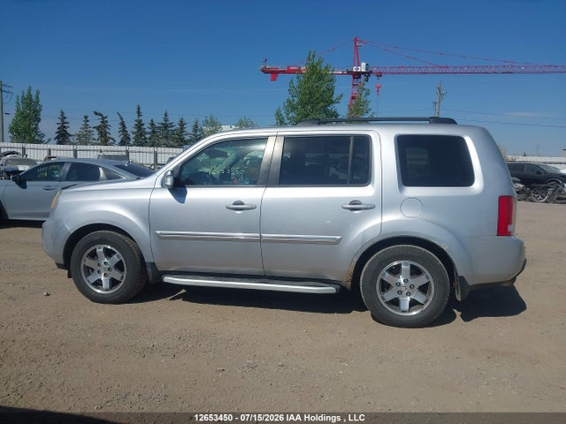 2010 Honda Pilot Touring მანქანა იყიდება აუქციონზე, vin: 5FNYF4H94AB502847, აუქციონის ნომერი: 12653450