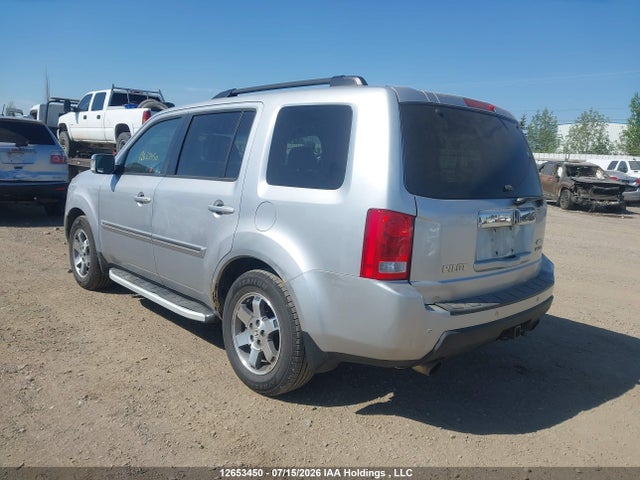 2010 Honda Pilot Touring მანქანა იყიდება აუქციონზე, vin: 5FNYF4H94AB502847, აუქციონის ნომერი: 12653450