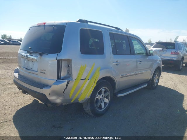 2010 Honda Pilot Touring მანქანა იყიდება აუქციონზე, vin: 5FNYF4H94AB502847, აუქციონის ნომერი: 12653450