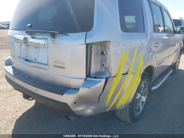 2010 Honda Pilot Touring მანქანა იყიდება აუქციონზე, vin: 5FNYF4H94AB502847, აუქციონის ნომერი: 12653450
