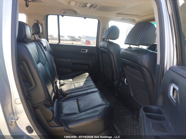 2010 Honda Pilot Touring მანქანა იყიდება აუქციონზე, vin: 5FNYF4H94AB502847, აუქციონის ნომერი: 12653450