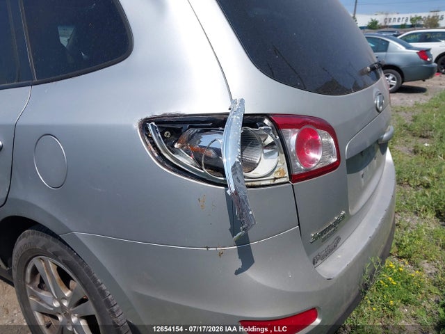 12654154 :رقم المزاد ، 5XYZG4AG9CG165632 vin ، 2012 Hyundai Santa Fe مزاد بيع
