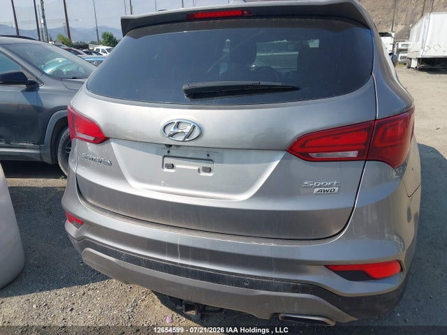 12654599 :رقم المزاد ، 5NMZUDLB5HH050078 vin ، 2017 Hyundai Santa Fe Sport مزاد بيع