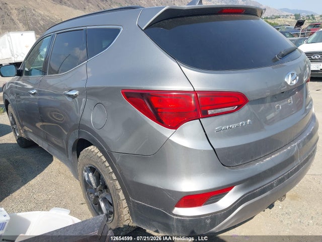 12654599 :رقم المزاد ، 5NMZUDLB5HH050078 vin ، 2017 Hyundai Santa Fe Sport مزاد بيع