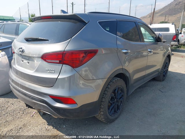 12654599 :رقم المزاد ، 5NMZUDLB5HH050078 vin ، 2017 Hyundai Santa Fe Sport مزاد بيع