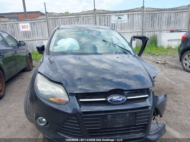 12654635 :رقم المزاد ، 1FADP3N25EL315218 vin ، 2014 Ford Focus Titanium مزاد بيع