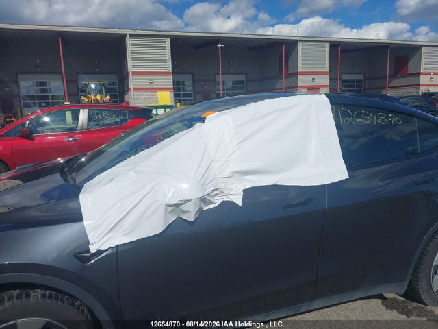 Tesla Model Y 2024 7SAYGDED0RF014757 Image 18