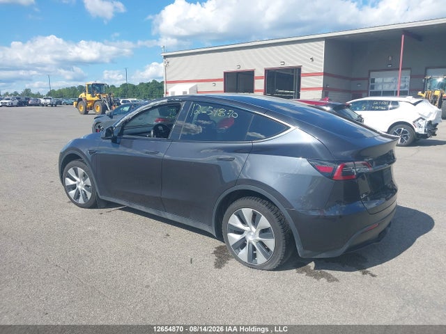Tesla Model Y 2024 7SAYGDED0RF014757 Image 3
