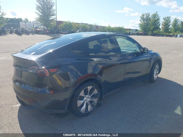 Tesla Model Y 2024 7SAYGDED0RF014757 Image 4