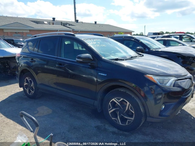 12655054 :رقم المزاد ، JTMRJREV7JD235776 vin ، 2018 Toyota Rav4 Hv Le Plus/xle مزاد بيع