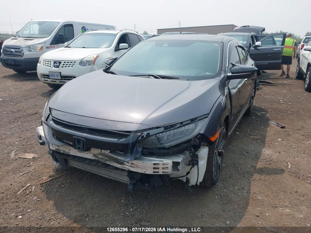 Honda Civic Touring 2019 2HGFC1F97KH101114 Image 2