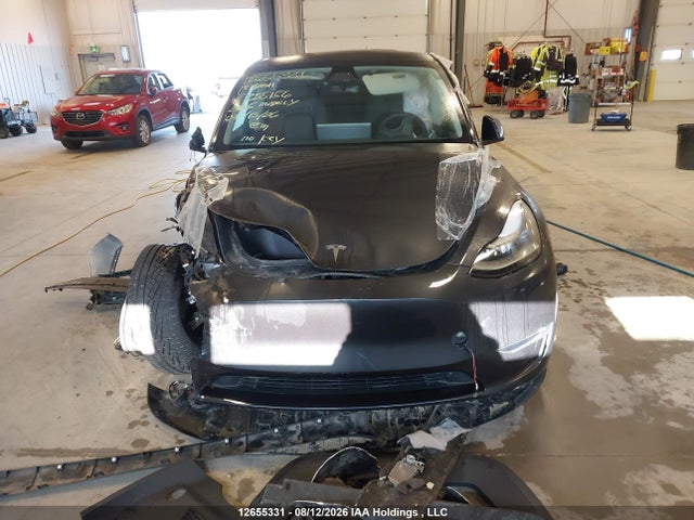 Tesla Model Y 2025 7SAYGAEE9SF235156 Image 13