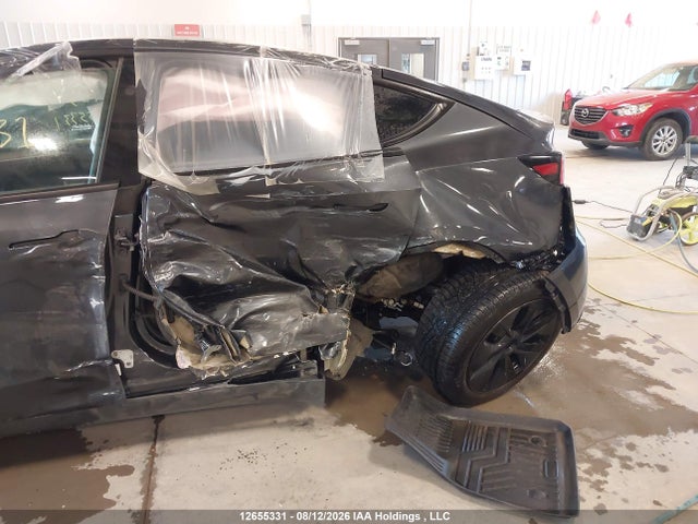 Tesla Model Y 2025 7SAYGAEE9SF235156 Image 6