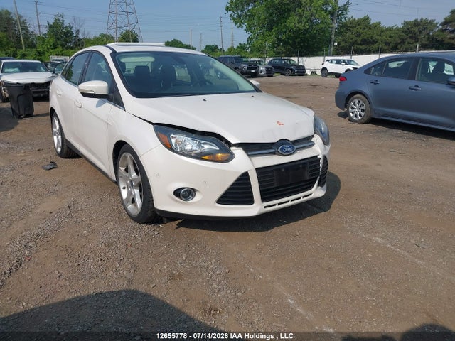 12655778 :رقم المزاد ، 1FAHP3J28CL305285 vin ، 2012 Ford Focus Titanium مزاد بيع