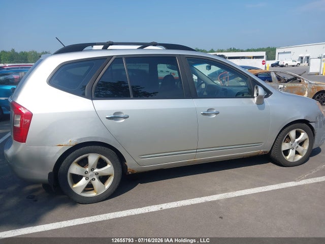 12655793 :رقم المزاد ، KNAFG526697275748 vin ، 2009 Kia Rondo Lx/ex مزاد بيع