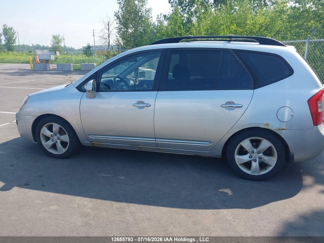 12655793 :رقم المزاد ، KNAFG526697275748 vin ، 2009 Kia Rondo Lx/ex مزاد بيع