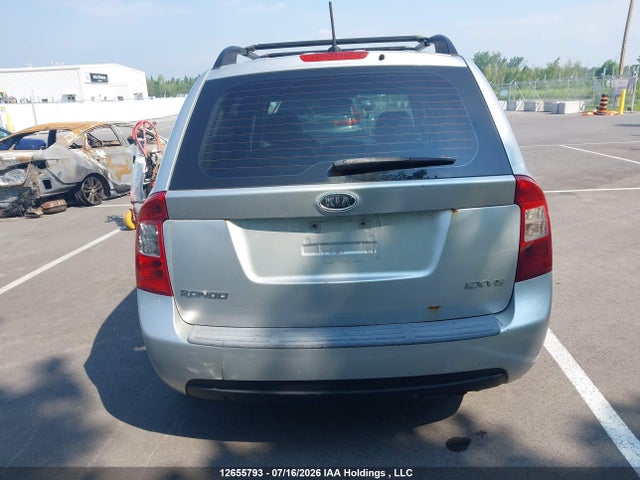 12655793 :رقم المزاد ، KNAFG526697275748 vin ، 2009 Kia Rondo Lx/ex مزاد بيع