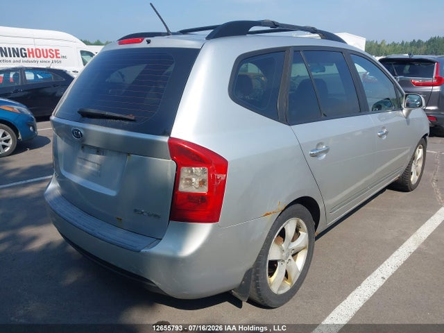 12655793 :رقم المزاد ، KNAFG526697275748 vin ، 2009 Kia Rondo Lx/ex مزاد بيع