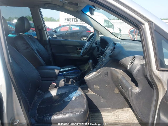 12655793 :رقم المزاد ، KNAFG526697275748 vin ، 2009 Kia Rondo Lx/ex مزاد بيع