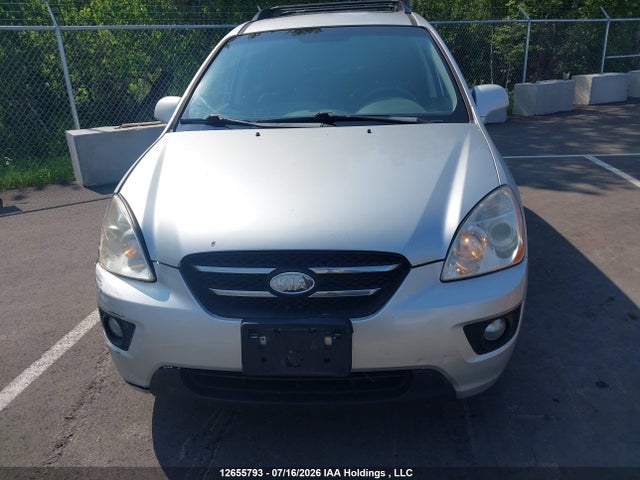 12655793 :رقم المزاد ، KNAFG526697275748 vin ، 2009 Kia Rondo Lx/ex مزاد بيع