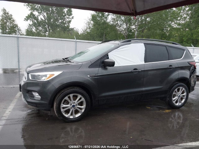 Продажа на аукционе авто 2018 Ford Escape Se, vin: 1FMCU0GDXJUC91915, номер лота: 12656571
