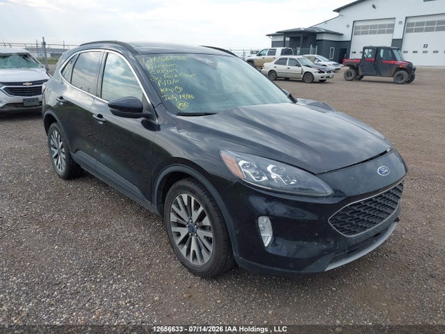 2020 Ford Escape Titanium მანქანა იყიდება აუქციონზე, vin: 1FMCU9J91LUC10909, აუქციონის ნომერი: 12656633