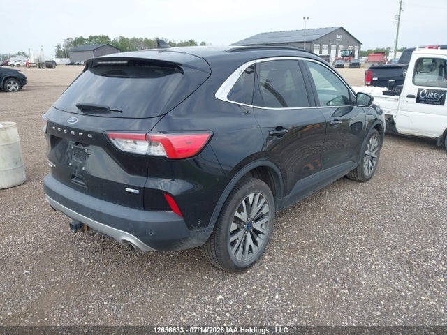 2020 Ford Escape Titanium მანქანა იყიდება აუქციონზე, vin: 1FMCU9J91LUC10909, აუქციონის ნომერი: 12656633