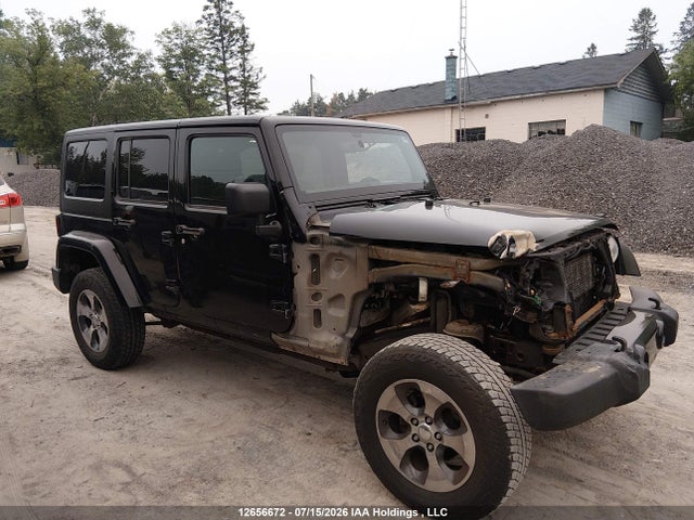 1C4BJWEG9JL801668 Jeep Wrangler Unlimited Sahara