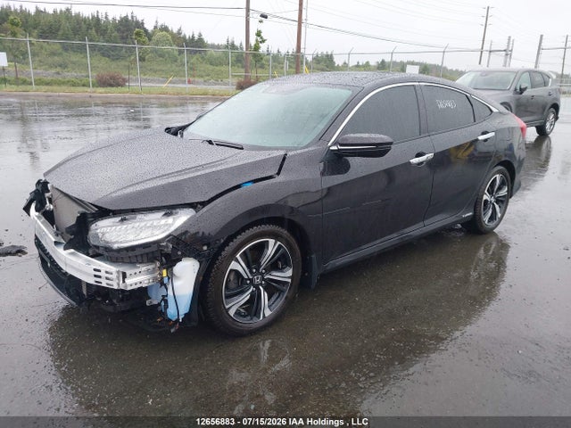 Auction sale of the 2017 Honda Civic Touring, vin: 2HGFC1F93HH106738, lot number: 12656883
