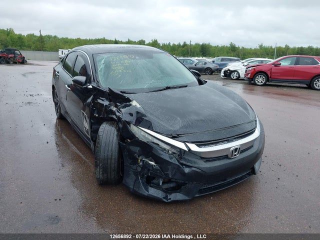 12656892 :رقم المزاد ، 2HGFC1F90GH108607 vin ، 2016 Honda Civic Touring مزاد بيع